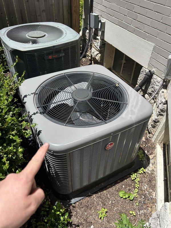 Completed Gold Level prepaid maintenance service on dual Rheem condensing units at residential property. Performed comprehensive inspection of both outdoor units including visual assessment of condenser coils, fan assemblies, and electrical connections. Verified proper operation of compressors and condenser fan motors on both systems. Inspected refrigerant line sets and electrical conduit routing along building exterior. Checked mounting pads and clearances around equipment for proper airflow and accessibility.

Accessed indoor air handler unit and inspected evaporator coil insulation for integrity and signs of moisture infiltration. Examined internal wiring connections and control circuits. Verified insulation material condition and noted normal wear patterns consistent with system age and operation. Both systems operating within normal parameters with no immediate service needs identified. All components functioning as designed at time of inspection.