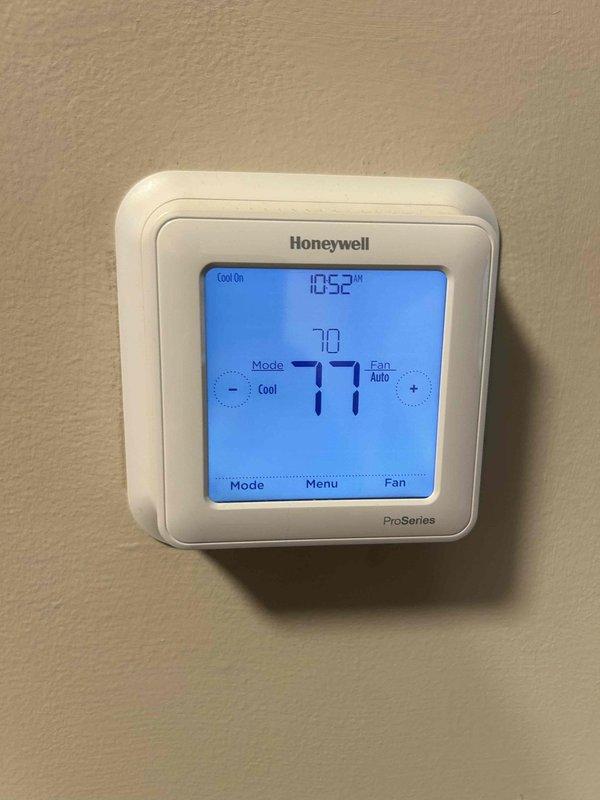 Responded to no cooling complaint on 7-year-old electric heat pump system with outdoor unit not running and warm air from indoor unit. Upon arrival, confirmed thermostat set to cooling mode at 77 degrees with system calling for cooling but outdoor condenser remaining inoperative. Performed diagnostic inspection of outdoor unit, checking electrical connections, capacitor, contactor, and compressor components. Identified failed component preventing condenser operation and completed necessary repairs to restore system functionality. Verified proper operation of heat pump with outdoor unit running and cold air delivery at registers upon completion.