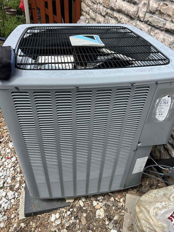 Responded to no cooling complaint on 7-year-old electric heat pump system with outdoor unit not running and warm air from indoor unit. Upon arrival, confirmed thermostat set to cooling mode at 77 degrees with system calling for cooling but outdoor condenser remaining inoperative. Performed diagnostic inspection of outdoor unit, checking electrical connections, capacitor, contactor, and compressor components. Identified failed component preventing condenser operation and completed necessary repairs to restore system functionality. Verified proper operation of heat pump with outdoor unit running and cold air delivery at registers upon completion.