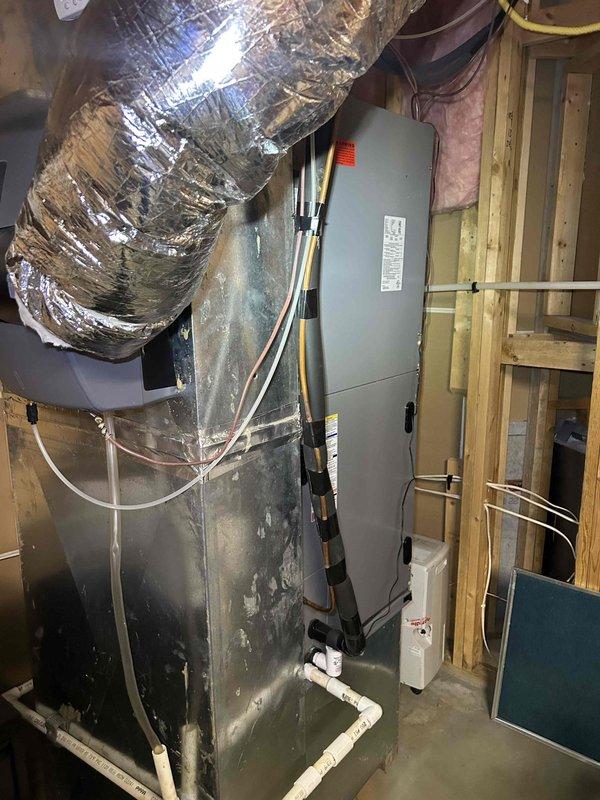 Responded to no cooling complaint on 7-year-old central air conditioning system. Upon inspection, discovered severely damaged low voltage thermostat wiring at outdoor condenser unit with deteriorated insulation exposing copper conductors. Wiring had experienced significant environmental degradation, compromising electrical connections and preventing system operation. Replaced damaged thermostat wire, restored proper electrical connections, and verified system functionality. Unit returned to normal cooling operation with all safety controls functioning properly.