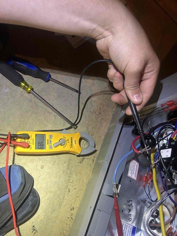Responded to callback for system not maintaining temperature with thermostat set to 71°F but reading 73°F and limited airflow. Performed comprehensive electrical diagnostics on control panel and system components using digital multimeter to test voltage, amperage, and continuity across circuits. Identified and addressed electrical issues affecting system performance and airflow delivery to restore proper cooling operation.