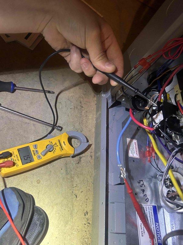 Responded to callback for system not maintaining temperature with thermostat set to 71°F but reading 73°F and limited airflow. Performed comprehensive electrical diagnostics on control panel and system components using digital multimeter to test voltage, amperage, and continuity across circuits. Identified and addressed electrical issues affecting system performance and airflow delivery to restore proper cooling operation.