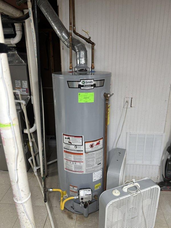 Completed routine plumbing inspection of residential water heating system. Inspected A.O. Smith water heater, verified proper operation of copper supply lines, brass fittings, and flexible gas connections, and documented system condition with no immediate issues identified.