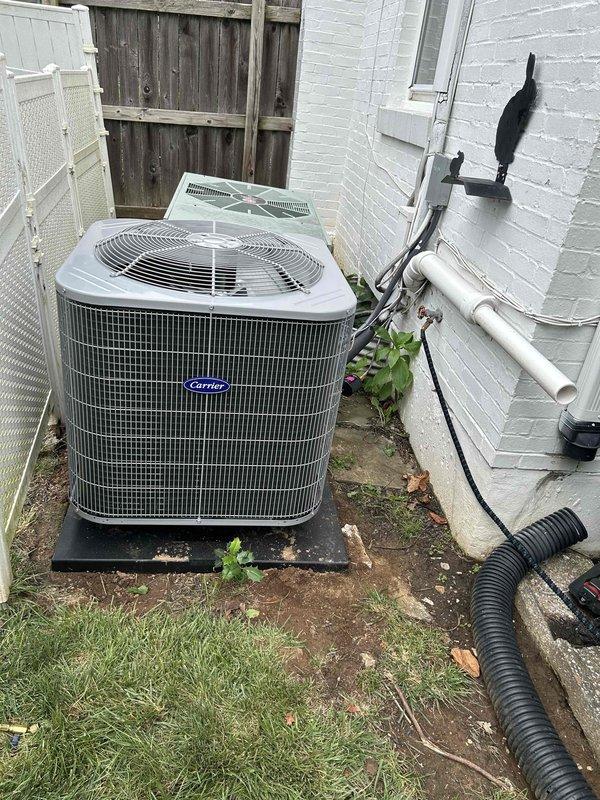 Completed full HVAC system replacement installing a Bryant 3-ton 14.3 SEER2 single-stage heat pump system with model GH5SAN53600A outdoor unit and FJ5ANXB36L00 air handler with auxiliary heat kit. Removed and properly disposed of existing equipment per code compliance requirements. Installed outdoor condenser unit on new equipment pad with snow legs for elevated clearance, mounted electrical disconnect box and whip kit on exterior wall, and ran insulated refrigerant line set with inline filter. Interior air handler installation included auxiliary heat kit, trap installation, SS2 coil drain safety water sensor, ceiling saver overflow drain pan with water sensor, transition connections to existing ductwork, and standard-sized air filter rack. Completed all electrical connections, refrigerant charging, and system startup procedures. Installed digital thermostat and verified proper operation of heating and cooling modes. All work performed with applicable permits and in compliance with loc