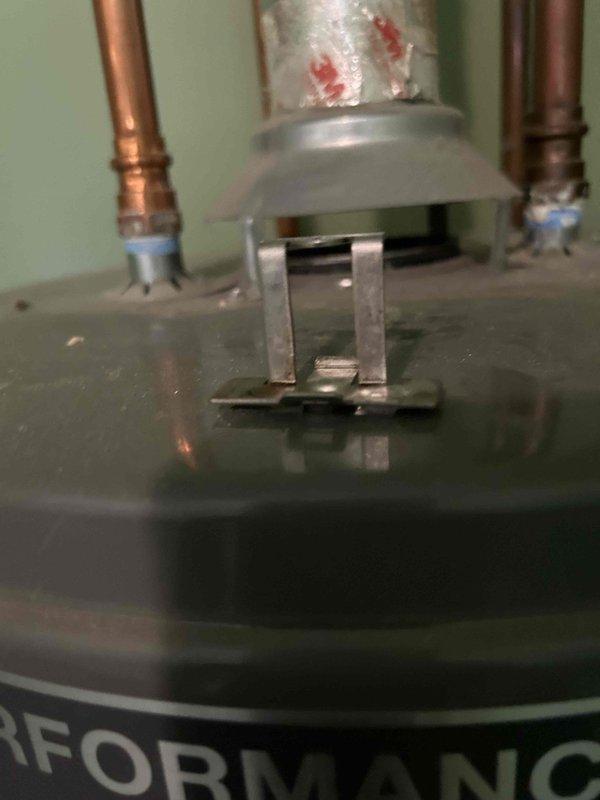 Responded to no hot water complaint on 6-year-old residential gas water heater. Upon arrival, confirmed pilot light was extinguished, likely due to recent storm activity. Inspected gas control valve, thermocouple, and burner assembly for proper operation. Successfully relit pilot light following manufacturer specifications and verified stable flame. Tested gas control valve functionality and confirmed proper temperature settings. Checked pressure relief valve, supply lines, and all plumbing connections for leaks or damage. Verified adequate combustion air supply and proper venting. Unit restored to full operation with hot water production confirmed before departure.