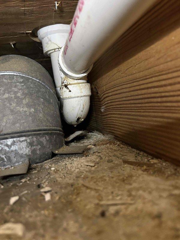 Performed comprehensive spring AC tune-up on 2-year-old air conditioning system with reported condensation issues on ductwork. Inspected condensate drain line and PVC piping connections in crawl space, verifying proper drainage and checking for leaks or blockages that could cause moisture accumulation. Measured system performance parameters including temperature differential across evaporator coil, which registered 43.74 degrees, indicating adequate cooling capacity and refrigerant charge. Examined all accessible ductwork for condensation, insulation integrity, and proper sealing. Cleaned and inspected 7-year-old washable filters located in garage. Checked refrigerant lines, electrical connections, and mechanical components for proper operation. System operating within normal parameters with no immediate concerns identified.