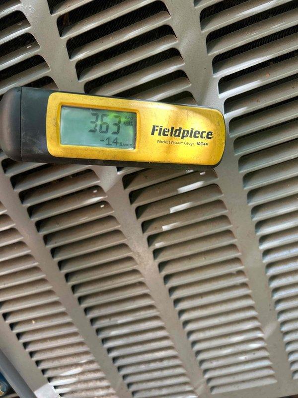 Replaced failed evaporator coil located in attic with new unit. Evacuated system to proper vacuum levels as verified by digital vacuum gauge, then recharged system with 7 pounds of refrigerant to manufacturer specifications. Work was scheduled for early morning hours due to extreme attic temperatures, and additional assistance was utilized during the first hour to facilitate safe coil installation in the confined attic space.
