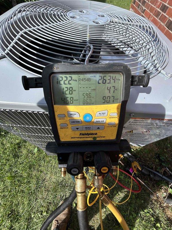Completed full HVAC system replacement installing Bryant 2-ton 14.3 SEER2 single-stage air conditioning unit (model GA5SAN52400W) with matching Bryant 2-ton evaporator coil (model CVAMA2417XMA) and condensate pump. Removed and properly disposed of existing equipment, then installed new outdoor condensing unit on existing pad utilizing existing disconnect box. Fabricated and installed new supply and return plenums, ran 6-inch supply ductwork, hung and sealed existing supply runs, and added additional floor return at customer-specified location per custom ductwork modifications. Connected refrigerant lines with copper piping, performed vacuum test, and charged system with R454B refrigerant to manufacturer specifications. Verified system operation with digital manifold gauges confirming proper superheat and subcooling temperatures, with readings showing system operating within normal parameters. Retained existing thermostat and integrated with new equipment. Obtained all applicable permit