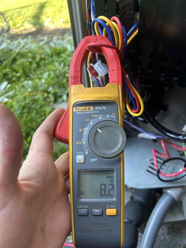 Completed annual preventative maintenance on a two-year-old residential air conditioning system as part of club membership benefits. Performed comprehensive AC tune-up including inspection of the single air handler unit with 1 HP blower motor. Accessed washable filter from crawlspace and verified proper airflow. Measured compressor amperage draw at 8.2 amps using clamp meter, confirming unit is operating within manufacturer specifications. Inspected blower wheel assembly and verified all blades are clean and free of debris with proper motor mounting. Checked all electrical connections at the outdoor unit and documented system performance. Unit showed no issues and is operating efficiently with no repairs needed at this time.