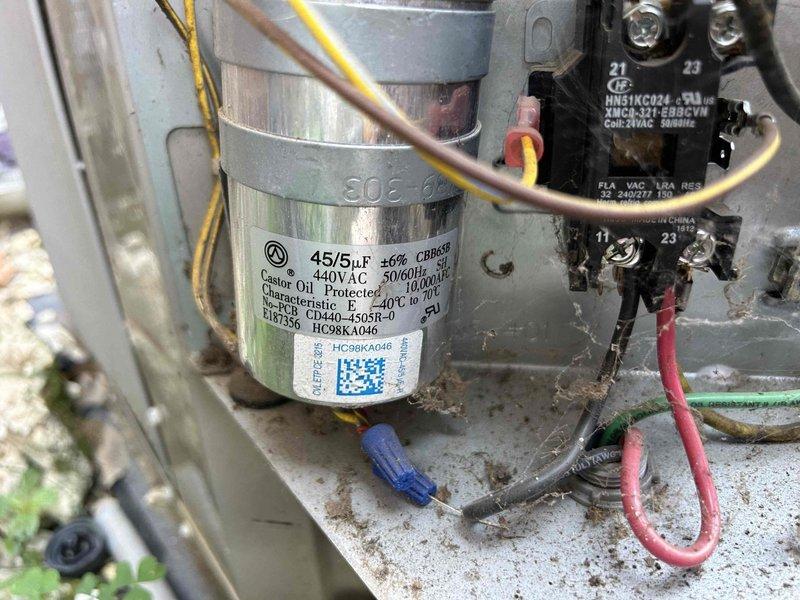 Completed routine care plan maintenance on air conditioning system with gas furnace located in first floor closet. Performed comprehensive tune-up inspection of both indoor and outdoor units. Verified electrical components including dual-run capacitor (45/5μF, 440VAC) and contactor relay, confirming all connections secure and within manufacturer specifications. Conducted electrical measurements at outdoor condensing unit using digital multimeter to verify proper voltage and amperage. Inspected all wiring terminations and found system operating normally. Customer provided 20x25x1 filter as specified. All components functioning properly with no issues identified during preventive maintenance visit.