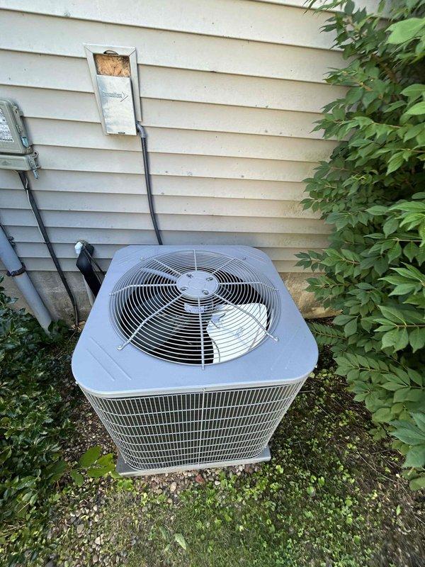 Completed full HVAC system installation including a Bryant 2-ton, 14.3 SEER2 single-stage air conditioning unit with matching evaporator coil. Removed and properly disposed of existing equipment, installed new outdoor condenser unit on prepared pad with electrical disconnect box and conduit, connected refrigerant lines with appropriate insulation, and integrated new evaporator coil with existing ductwork using proper sealing methods. All work performed to code compliance standards with applicable permits obtained, system tested and operational upon completion.