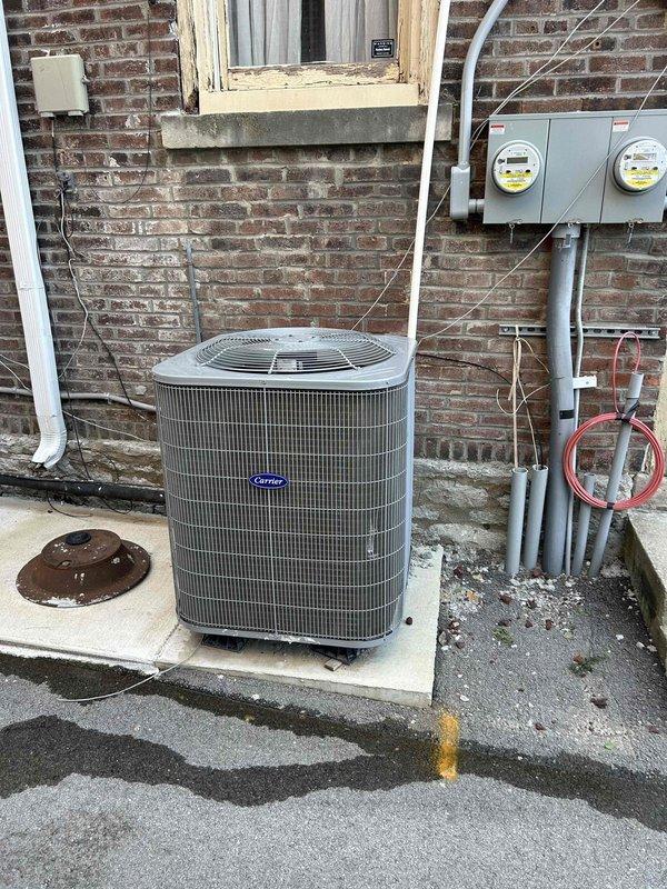 Completed preventive maintenance tune-up on dual air conditioning and gas furnace systems per club membership agreement. Performed comprehensive inspection of outdoor Carrier AC unit, verified electrical connections at meter panel, tested system amperage draw at 12.3A and voltage at acceptable levels, and inspected capacitor operation. Customer provides their own air filters for these units.