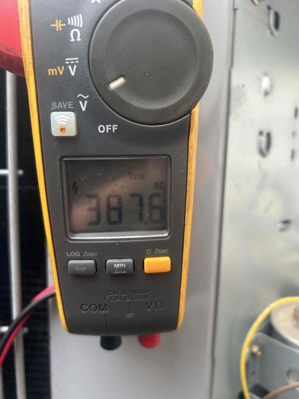 Completed Club Green preventive maintenance tune-up on gas furnace/heat pump system located in attic. Performed comprehensive electrical diagnostics on outdoor unit using professional-grade clamp meter, verifying amperage draw and voltage readings to ensure proper system operation. All electrical connections at outdoor disconnect inspected and found secure. System operating within manufacturer specifications with measured amperage at 6.6A and voltage reading of 38.76V recorded during testing. Customer to provide air filters as previously arranged.