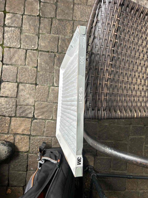 Responded to no cooling call for 5-year-old residential AC system serving entire condo unit. Located outdoor condensing unit on ground level and indoor air handler in closet. Performed system diagnostics and replaced 16x20x1 air filter to restore proper airflow and cooling operation.