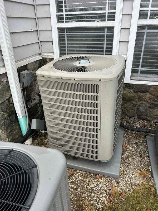 Responded to no cooling call for 5-year-old residential AC system serving entire condo unit. Located outdoor condensing unit on ground level and indoor air handler in closet. Performed system diagnostics and replaced 16x20x1 air filter to restore proper airflow and cooling operation.