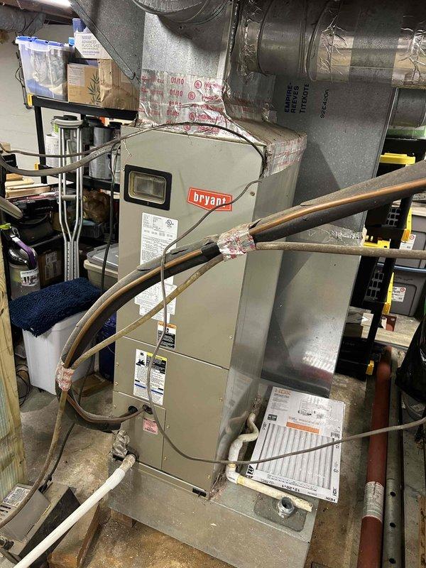 Responded to non-urgent service call for upstairs attic HVAC system with reported UV light electrical failure. Upon inspection, discovered UV light wiring was fried, likely due to improper installation by previous contractor. Documented existing conditions with photographs showing heavily contaminated evaporator coil with significant dust, dirt, and biological growth accumulation that has severely restricted airflow capacity. System requires UV light replacement with proper wiring installation and comprehensive coil cleaning to restore efficient operation. Provided quote for necessary repairs and maintenance work.