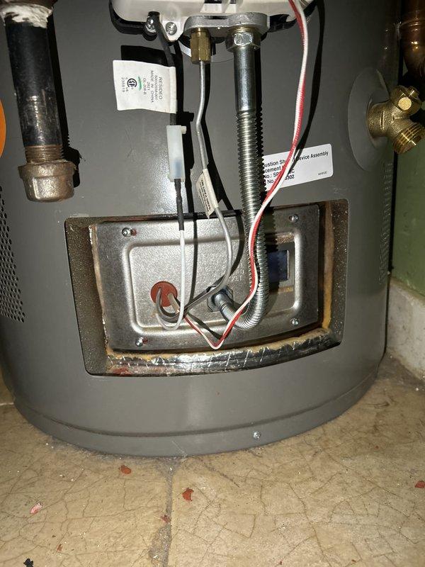 Responded to water heater pilot light failure and performed diagnostic inspection. Disassembled burner assembly and identified thermal release device (TRD) had activated, blocking air circulation to the combustion chamber. Contacted Rheem warranty support, registered the unit, and coordinated replacement part shipment directly to property. Replacement TRD component has been received on-site and is ready for installation to restore water heater operation.