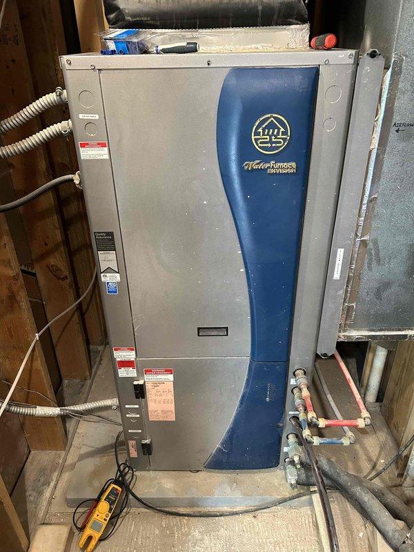 Responded to no cooling complaint on downstairs zone of 18-year-old WaterFurnace geothermal system. Performed diagnostic evaluation of zoned HVAC system including inspection of geothermal heat pump unit, zone dampers, and associated electrical components. Verified proper operation of disconnect switch, checked refrigerant lines, and inspected control wiring at unit and zone control panel. System evaluated for age-related component wear and operational efficiency concerns typical of equipment approaching end of expected service life.