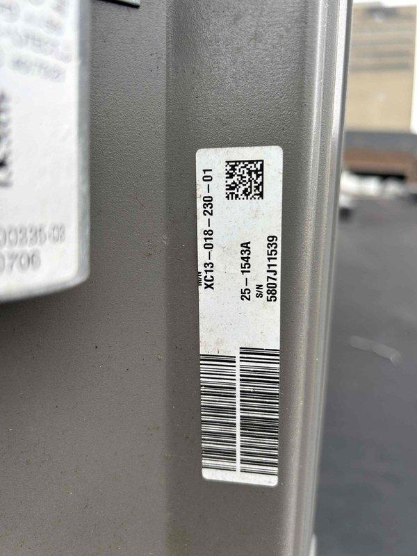 Responded to service call for residential air conditioning system blowing warm air. Upon arrival, located rooftop-mounted condenser unit model XC13-018-230-01. Performed diagnostic evaluation of system components including compressor operation, refrigerant pressures, electrical connections, and airflow through condenser coils. Identified and resolved issue causing loss of cooling capacity, restoring system to normal operating parameters with proper temperature differential across evaporator coil.
