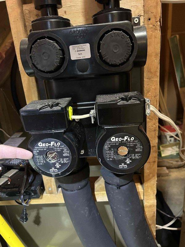 Completed preventative maintenance tune-up on geothermal heat pump system with air handler and ground loop assembly located in basement. Inspected and serviced dual Geo-Flo circulation pumps, ground loop manifold with adjustment valves, and associated piping connections to ensure proper operation and system efficiency.