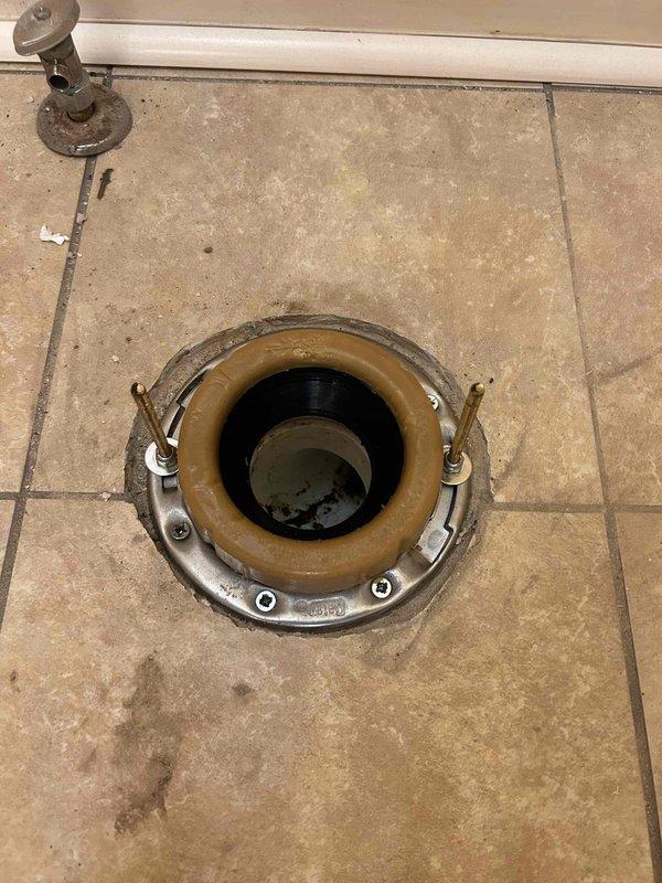 Successfully installed shower piping and completed rough-in work. Upon inspection, discovered the toilet flange area has compromised subfloor due to water damage and rot, preventing secure mounting of the flange and toilet installation. The wax ring and drain connection are prepared, but structural integrity of the flooring must be addressed before proceeding. Will return at no additional charge once flooring replacement is completed to properly secure the flange and set the toilet.