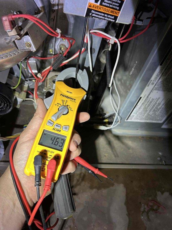 Completed comprehensive air conditioning maintenance tune-up on system installed in 2021, located in crawlspace. Performed standard preventive maintenance procedures including visual inspection of condenser motor and fan assembly, electrical testing showing normal amperage draw of 46.3 amps, verified proper operation of all components, and confirmed washable filter accessibility. All equipment operating within normal parameters with no deficiencies noted.