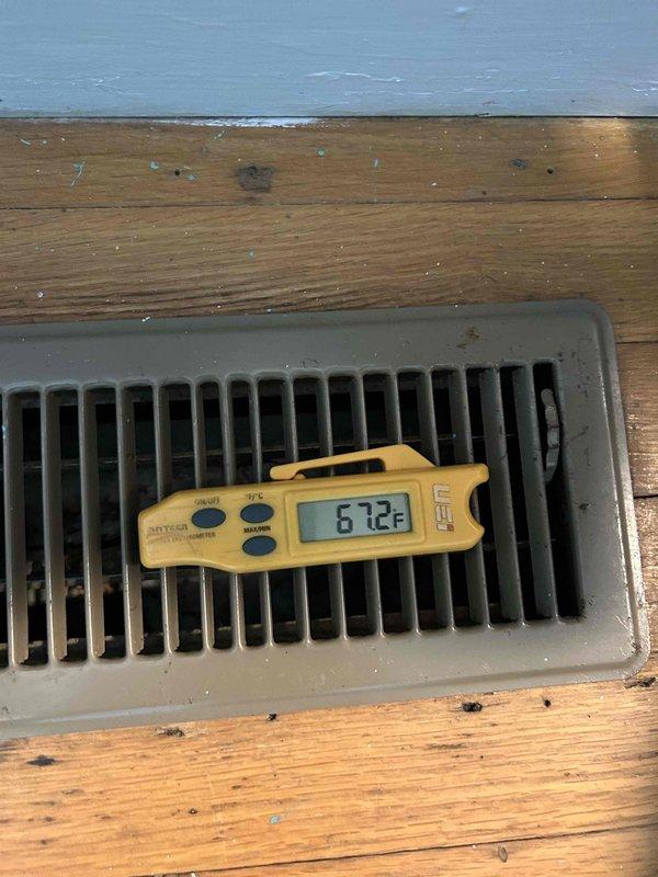 Responded to no cooling call on 20-year-old air conditioning system. Upon inspection, discovered severe electrical failure with significant burn damage and charring at wire connection point in outdoor unit's control panel. Supply air temperature measured at 67.2°F, confirming complete loss of cooling capacity. Due to age of equipment and extent of electrical damage, recommended system replacement. Customer expressed interest in enrolling in maintenance service plan during visit.