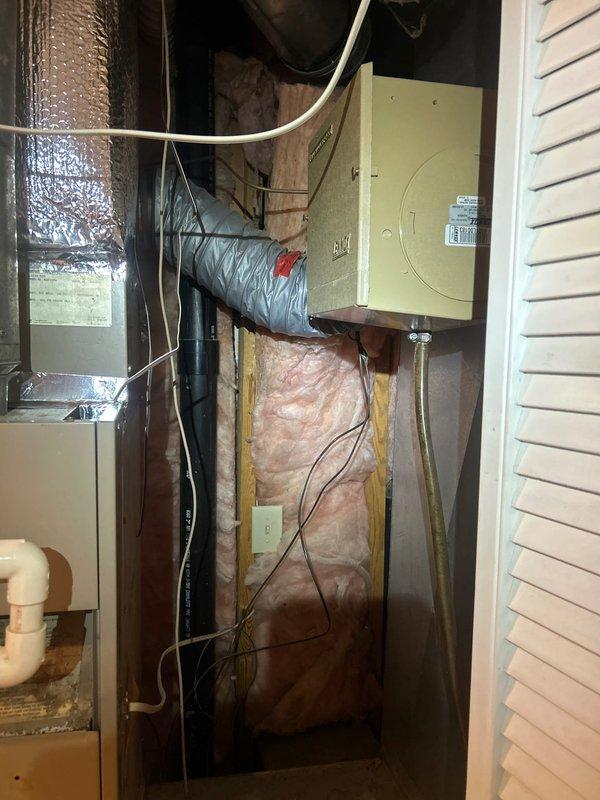 Provided comprehensive replacement estimate for 40-year-old residential cooling system experiencing continuous fan operation and warm air discharge throughout home. Documented existing forced air furnace and air handler installation in utility closet, photographing equipment specifications and mechanical configuration for replacement planning. System assessment confirmed age-related failure requiring full HVAC replacement rather than repair.