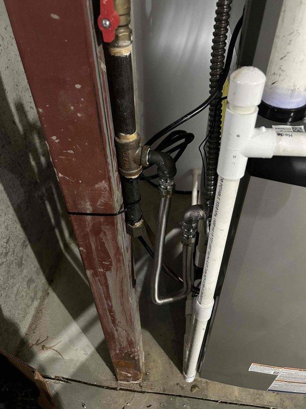 Completed full HVAC system replacement including installation of Lennox 2.5 ton single-stage air conditioner (model ML14KC1-030), 97% efficiency furnace (model EL297UH090XE48), and evaporator coil (model CCK40UT-36C-71) with AHRI certification 218073237. Removed and disposed of existing equipment, obtained applicable permits, and installed new outdoor unit pad, electrical whip kit, disconnect box, refrigerant line insulation, line filter drier, and coil-to-ductwork transition. Installed SS2 coil drain safety water sensor, tested all system operations for proper functionality, and verified code compliance throughout installation.