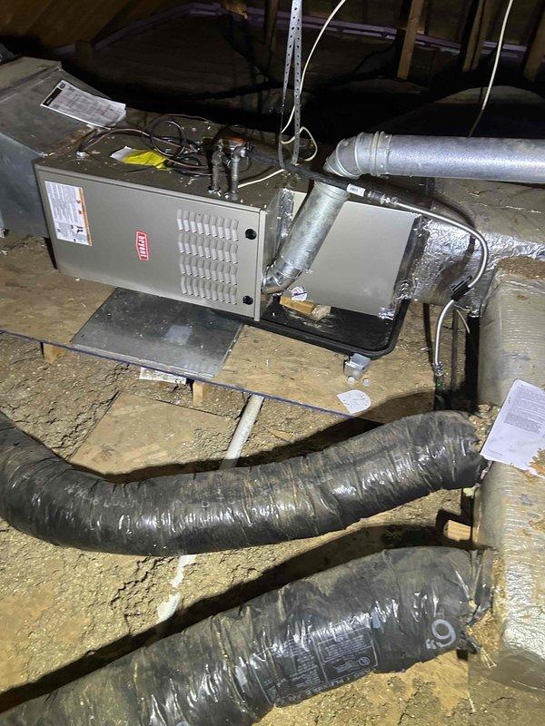 Completed full residential HVAC system installation in attic space, including Bryant 90,000 BTU 80% efficiency gas furnace (Model 800SB42090M17), Bryant 2.5 ton evaporator coil (Model CVAMA3017XMA), and Bryant 2.5 ton 15 SEER2 air conditioning unit (Model GA5SAN53000W). Removed and properly disposed of existing equipment per code requirements. Installed outdoor unit on new concrete pad with electrical disconnect box, whip kit, and insulated refrigerant lines with filter drier. Mounted air handler on wooden platform in attic with proper transitions to ductwork and connected evaporator coil assembly. Enlarged return air grille to ensure adequate airflow for system capacity requirements. Integrated existing thermostat and filter cabinet into new system. Installed SS2 coil drain safety water sensor for overflow protection. Secured all necessary permits and completed installation per local code compliance standards. Tested all system operations including heating cycle, cooling cycle, airflo