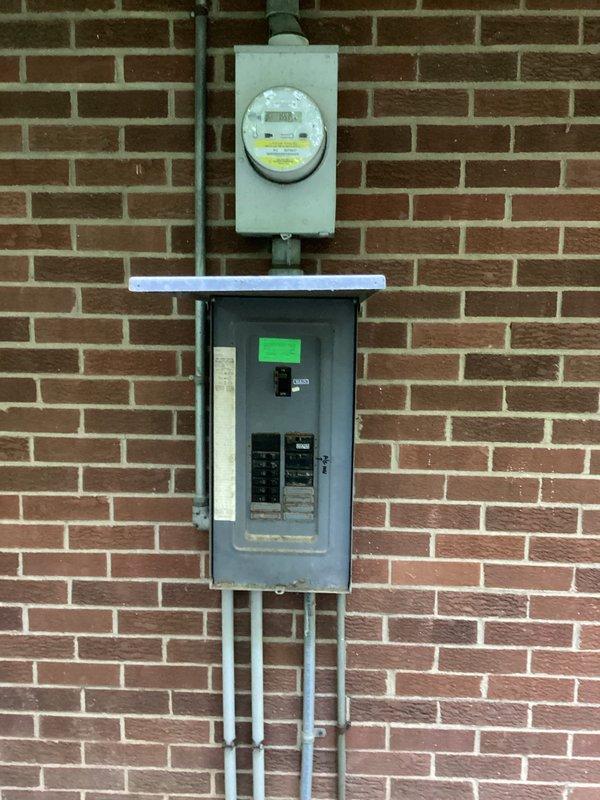Performed comprehensive electrical assessment for portable generator hookup installation at residential property. Inspected existing electrical service and identified obsolete Stab-Lok panel requiring replacement due to known safety concerns and code compliance issues. Evaluated current panel configuration, main disconnect, branch circuit capacity, and existing wiring conditions. Documented aging electrical infrastructure including cloth-insulated conductors and weathered components. Prepared estimate for complete generator interlock or transfer switch installation, potential service panel upgrade to modern load center with appropriate amperage rating, and assessment of service entrance capacity to support additional generator load. Recommended full panel replacement to ensure safe and compliant portable generator connection.