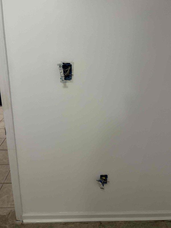 Responded to pre-purchase home inspection concerns regarding ungrounded and unsafe electrical outlets in the basement. Performed comprehensive evaluation of the electrical system, including inspection of outlet boxes, wiring configurations, and grounding conditions. Identified missing ground connections at multiple receptacle locations and documented findings with photographic evidence for the real estate transaction.