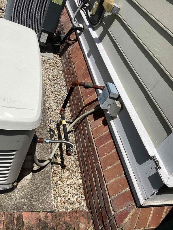Performed annual preventive maintenance on Generac standby generator installed approximately one year prior. Conducted comprehensive tune-up including visual inspection of unit exterior, electrical connections, fuel lines, and exhaust system. Verified proper operation of automatic transfer switch, tested battery voltage and charging system, inspected air filter and cooling system components, and confirmed all control panel indicators functioning correctly. Unit operating within manufacturer specifications with no issues identified.