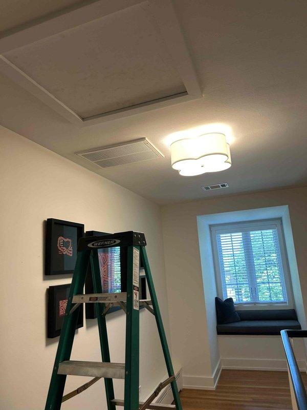 Responded to no cooling call on approximately one-year-old Lennox AC system with indoor unit located in attic. Upon arrival, verified system was not operating and upstairs area lacked conditioned air. Performed diagnostic evaluation of outdoor condensing unit and indoor air handler components. Inspected electrical connections at disconnect box, verified power supply, and checked thermostat communication. System evaluated and photographed for documentation purposes.