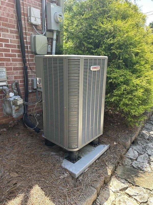 Responded to no cooling call on approximately one-year-old Lennox AC system with indoor unit located in attic. Upon arrival, verified system was not operating and upstairs area lacked conditioned air. Performed diagnostic evaluation of outdoor condensing unit and indoor air handler components. Inspected electrical connections at disconnect box, verified power supply, and checked thermostat communication. System evaluated and photographed for documentation purposes.