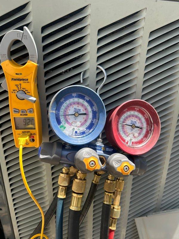 Responded to no cooling complaint on upstairs electric HVAC unit located in attic. Performed diagnostic testing using manifold gauges and clamp meter to assess system performance and electrical readings. Inspected attic-mounted air handler, ductwork, and associated components to identify cause of cooling failure on this infrequently used system.