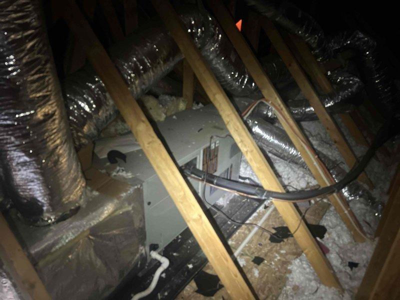 Responded to no cooling complaint on upstairs electric HVAC unit located in attic. Performed diagnostic testing using manifold gauges and clamp meter to assess system performance and electrical readings. Inspected attic-mounted air handler, ductwork, and associated components to identify cause of cooling failure on this infrequently used system.