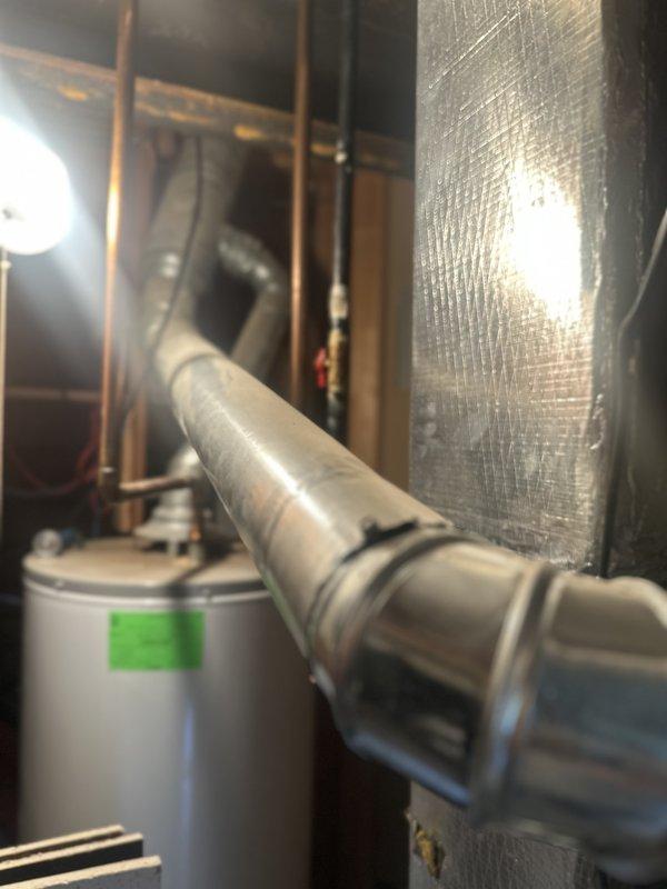Conducted comprehensive equipment assessment for dual-system HVAC replacement estimate at residential property. Evaluated existing 10-12 year old Trane equipment with one indoor unit located in attic and second unit in basement. Documented current system conditions through photographic documentation of mechanical room showing condensate drainage configuration, ductwork insulation, and equipment accessibility. Assessed interior supply vent locations and distribution system. Provided replacement options focusing on Trane equipment specifications to match customer preference and discussed financing availability for immediate replacement needs.