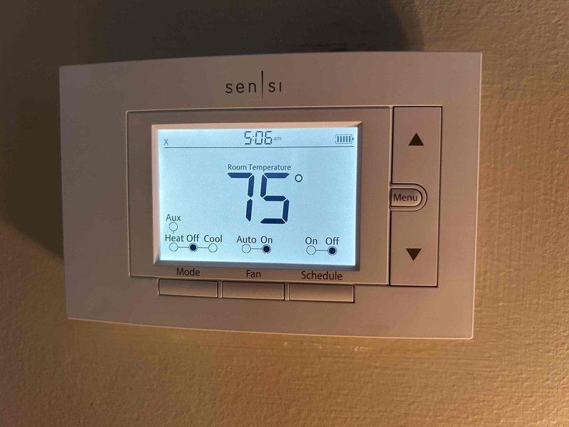 Responded to no-cooling call on 9-year-old heat pump system. Upon arrival, verified compressor would not start and thermostat was calling for cooling. Inspected outdoor unit and found failed dual-run capacitor preventing compressor and condenser fan motor from operating. Replaced defective capacitor with properly-rated unit, restored power, and verified system operation with normal compressor start-up and cooling cycle.