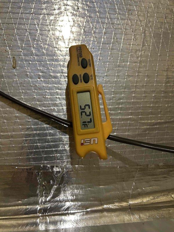 Responded to callback for newly installed system that would not shut off upon reaching setpoint temperature. System was overcooling to 68°F despite thermostat set at 73°F, requiring customer to disable power at breaker panel. Performed diagnostic testing and confirmed supply air temperature at 52°F and return air temperature at 69°F, indicating proper refrigerant charge and system operation. Identified thermostat control issue preventing compressor from cycling off at target temperature. Corrected thermostat wiring and configuration settings to restore proper temperature control functionality. Verified system now cycles correctly and maintains setpoint without overcooling.