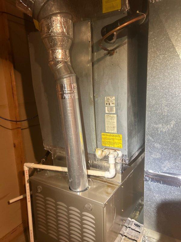 Responded to no cooling complaint on electric HVAC system with 18-degree temperature differential between thermostat setpoint and actual indoor temperature. Performed diagnostic evaluation of basement-located air handler and condensing unit to determine cause of insufficient cooling capacity. Upon inspection and system assessment, provided comprehensive replacement estimate for AC system and evaporator coil due to equipment failure preventing adequate cooling performance.