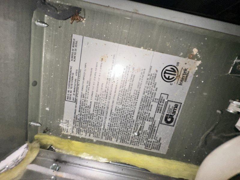 Conducted comprehensive evaluation of two residential HVAC systems for replacement estimate. Inspected 11-year-old and 18-year-old gas furnace systems with heat exchangers located in basement and attic. Assessed attic-mounted air handler unit with associated flexible and rigid ductwork configurations. Documented equipment conditions, age-related wear, and operational status through photographic evidence. Reviewed system specifications and equipment labels to determine current capacities and compatibility requirements for replacement units. Provided replacement options and recommendations for dual-system installation to address immediate heating and cooling needs.