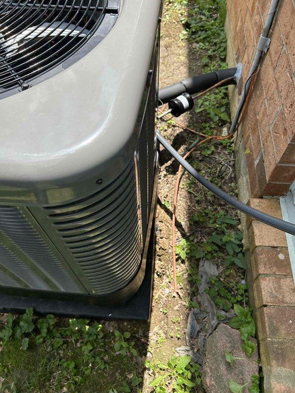 Replaced outdoor condensing unit under first-year manufacturer warranty due to compressor failure with metal shavings contamination. Prior to removal, documented compressor readings, captured video evidence of malfunction and internal metal debris as required by technical support. Installed replacement ODU on existing pad, photographed new unit data tag for warranty documentation, and completed JSIS forms for the new equipment per technical support requirements.