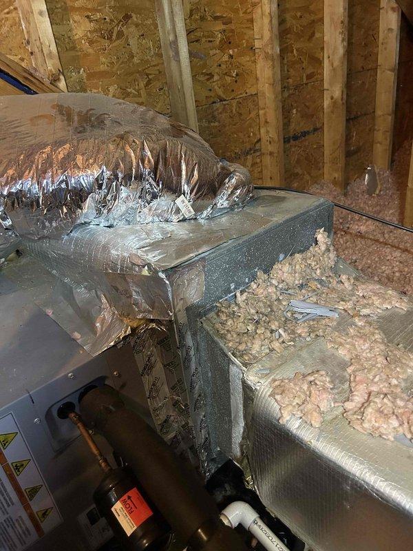 Responded to no cooling complaint on 8-year-old residential air conditioning system with gas furnace. Customer reported intermittent operation where system would run briefly before shutting down and requiring manual reset after extended wait period. Located air handler unit in attic space with flexible ductwork installation.

Performed diagnostic evaluation of system components and operational cycle. Measured supply air temperature at ductwork registering 63.5°F, indicating inadequate cooling performance. Inspected air handler, refrigerant lines, and ductwork connections in attic installation area. Observed copper refrigerant line routing and duct insulation condition. Evaluated system for potential causes of short cycling including airflow restrictions, refrigerant charge issues, safety limit switches, and control board functionality.

Documented system conditions with temperature readings and visual inspection of installed components. Verified proper duct insulation and connection in