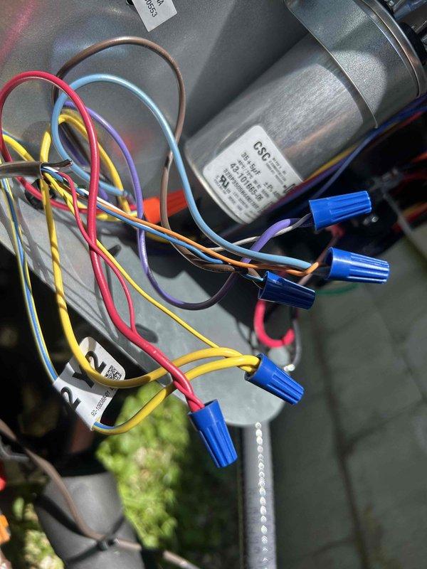 Responded to callback for strong odor complaint from newly installed HVAC system near return vents by thermostat. Inspected thermostat wiring connections and outdoor unit electrical terminations, verifying all wire connections were secure and properly terminated with no signs of overheating or burning that would cause odor issues. Determined system wiring and electrical components were installed correctly per manufacturer specifications.