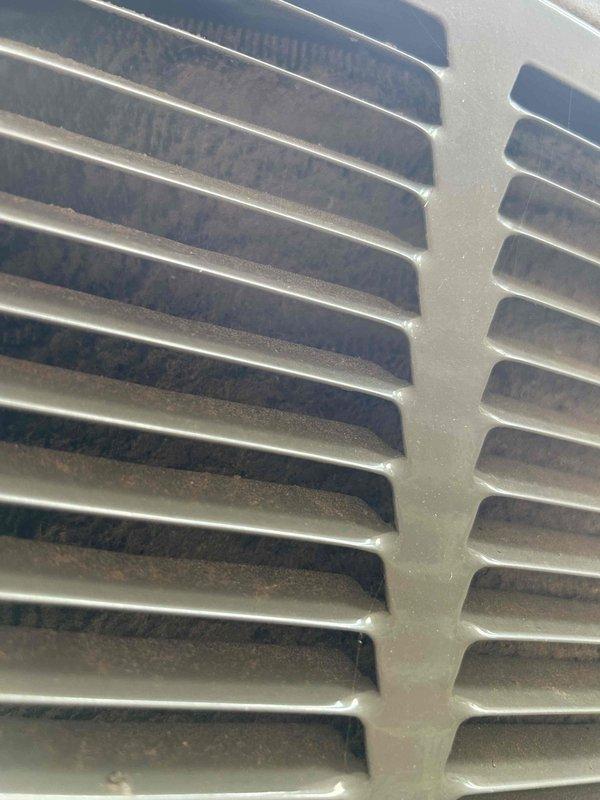 Responded to no cooling complaint on aging air conditioning system with indoor unit located in crawlspace. Upon inspection, found system operating but unable to maintain proper temperature differential, reading 2-5 degrees off setpoint consistently. Accessed crawlspace unit via ladder and performed comprehensive diagnostic evaluation of both indoor and outdoor components. Inspected electrical connections, refrigerant pressures, airflow delivery, and overall system performance. Evaluated air handler components including blower motor operation and evaporator coil condition. Checked condensate drainage and ductwork for restrictions. Examined return air filter housing and found no filter present, contributing to reduced airflow and diminished cooling capacity. Inspected outdoor condensing unit for proper operation, including compressor function, condenser fan motor performance, and heat rejection efficiency. Assessed refrigerant charge and system pressures to determine if low refrigerant o