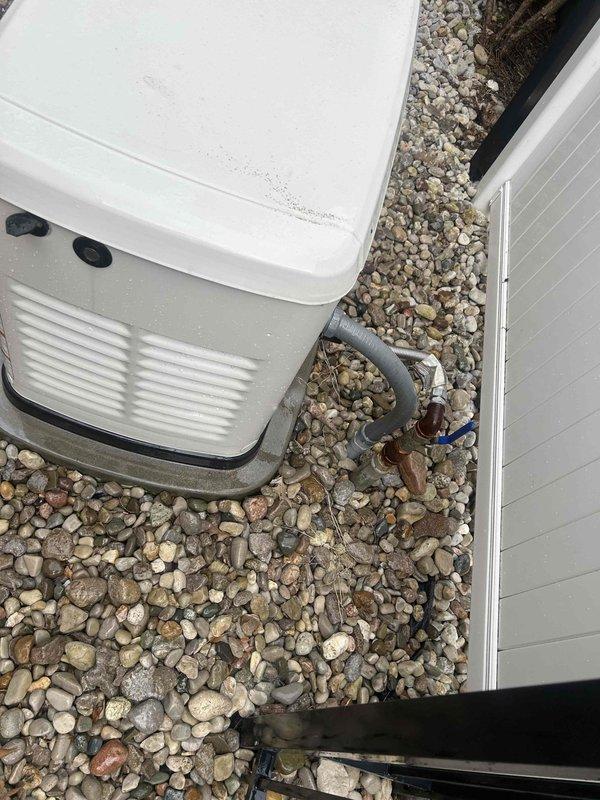 Completed routine maintenance on a 24 KW Generac Evolution standby generator. Performed standard inspection procedures, verified proper operation of all systems, and documented unit condition with photographic records. Unit found in operational condition with adequate clearance and proper installation on stabilized rock bed foundation.