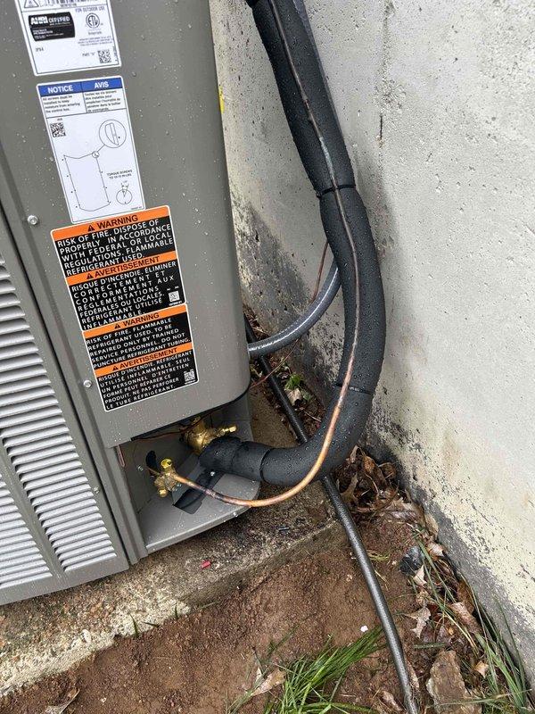 Completed full residential HVAC system replacement including installation of Lennox Elite Series 18 SEER2 variable capacity air conditioner (Model EL18KCV-036), Lennox Dave Signature Series 80% AFUE 90,000 BTU variable speed furnace (Model SL280UH090V48BK), and matching evaporator coil (Model CK40CT-036B-71). Removed and properly disposed of existing equipment per code requirements.

Installed outdoor condensing unit on concrete pad with electrical whip kit, disconnect box, and insulated refrigerant lines with filter drier. Mounted unit against exterior wall with properly secured black conduit for electrical connections. Indoor installation included furnace with variable speed blower, evaporator coil with transition fittings to existing ductwork, and standard air filter rack. Connected unit to existing flue piping with flame rollout protection. Installed flexible gas line connector with gas shutoff switch and electrical shutoff switch per code.

Modified basement return air ductwork to