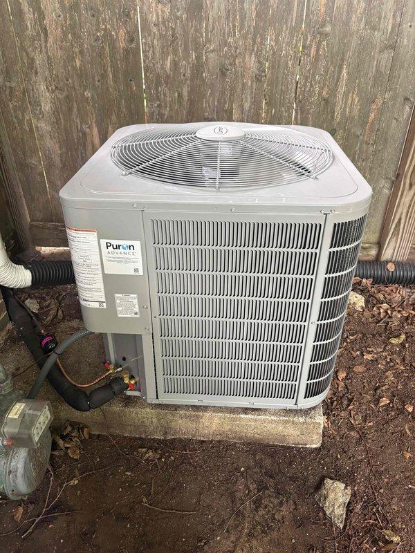 Replaced outdoor condensing unit under warranty claim. Removed failed ODU and installed new Puron ADVANCE model on existing concrete pad. Documented serial numbers and equipment tags from both old and new units with photographs as required for warranty processing. Verified proper refrigerant line connections and electrical disconnect. Unit operational upon completion.