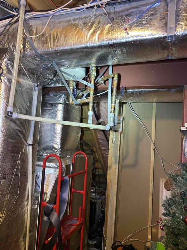 Replaced defective warranty control board and molex plug on HVAC system. Upon inspection, noted significant ice accumulation on refrigerant lines indicating previous system malfunction. Successfully installed new components and restored system to proper operating condition.